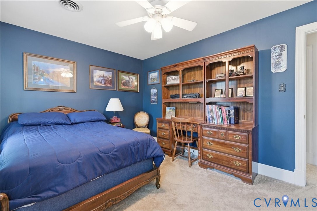 14110 Howlett Line Drive Colonial Heights, VA 23834 - Photo 24 of 44 a bedroom with a bed furniture and a window