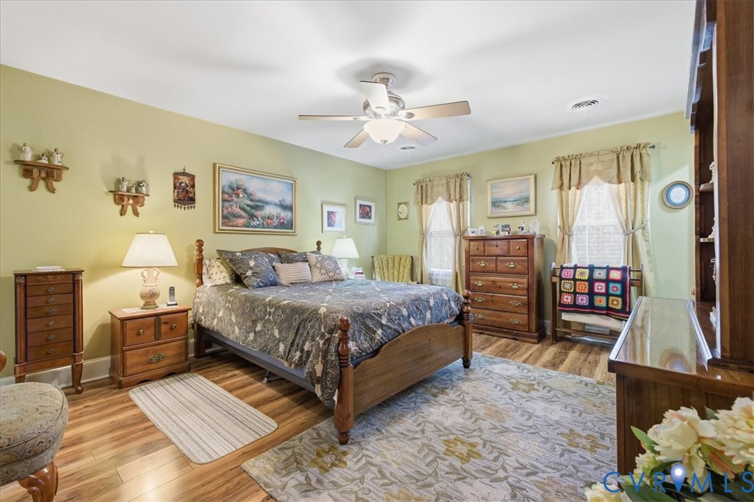 14110 Howlett Line Drive Colonial Heights, VA 23834 - Photo 31 of 44 a bedroom with a bed window and dresser