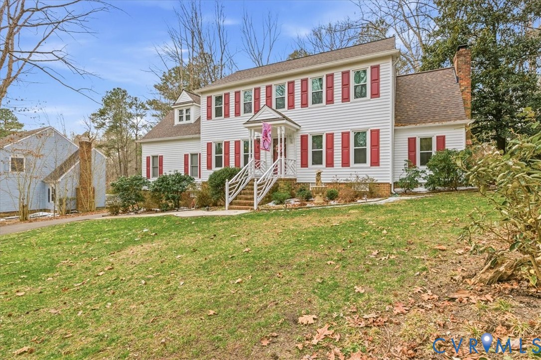 14110 Howlett Line Drive Colonial Heights, VA 23834 - Photo 4 of 44 a front view of a house with garden