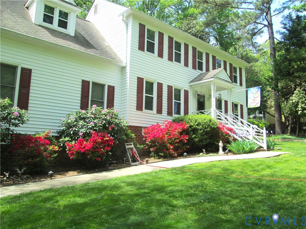 14110 Howlett Line Drive Colonial Heights, VA 23834 - Photo 43 of 44 a view of a house with a big yard and potted plants