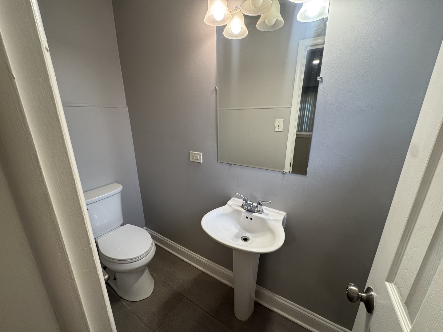 15125 East End Avenue Dolton, IL 60419 - Photo 5 of 21 a bathroom with a sink toilet and mirror