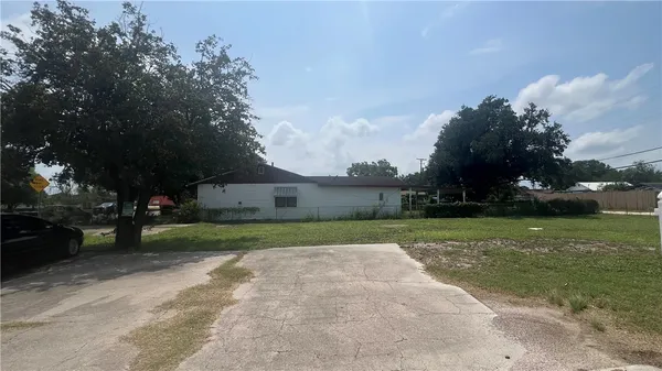 a view of a park and entertaining space