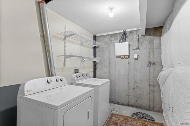 a utility room with dryer and washer