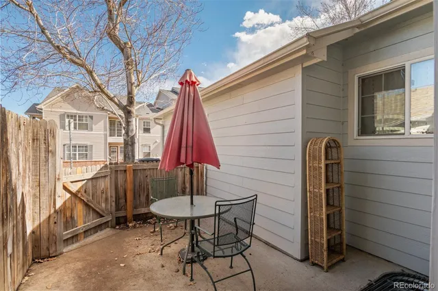 a backyard of a house with seating space