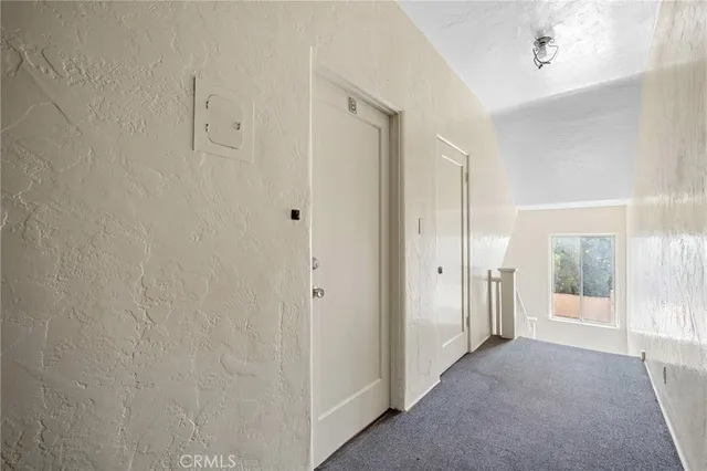 a view of a bathroom with a glass door