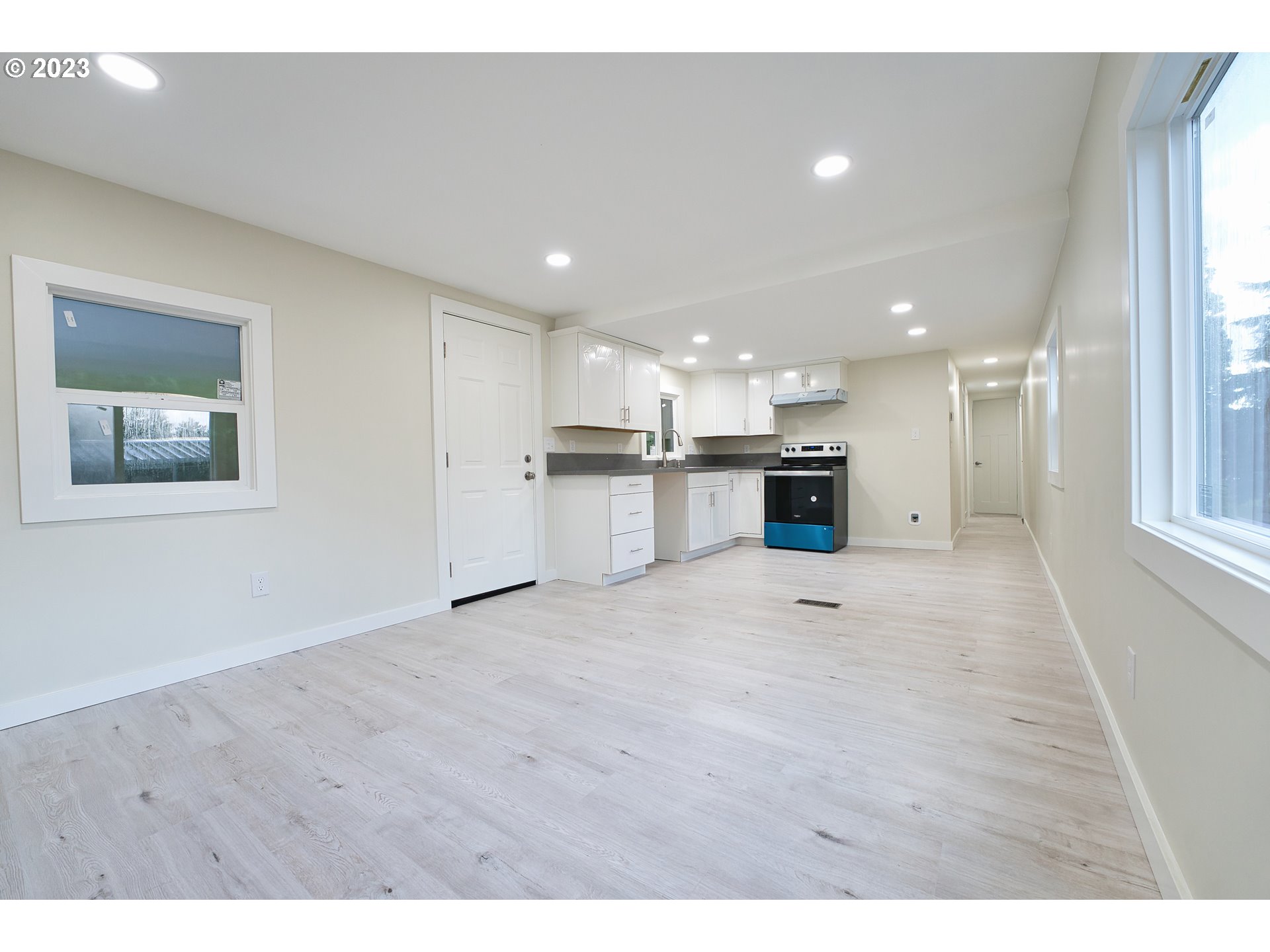 17655 Bluff Road, Unit 41 Sandy, OR 97055 - Photo 7 of 21 a view of a kitchen with a sink a refrigerator and a window
