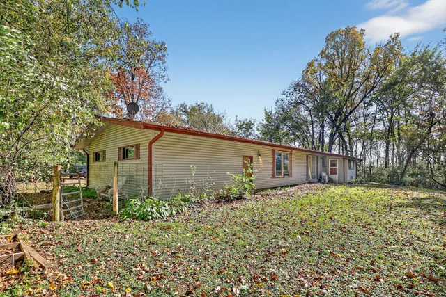 a backyard of a house with lots of green space
