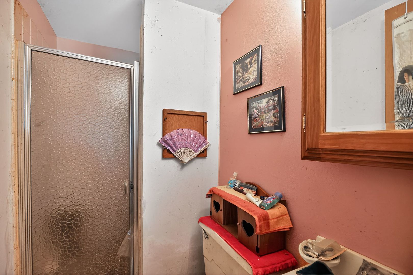 21364 Burr Oak Road Harvard, IL 60033 - Photo 12 of 15 a room with a wall painting and a table