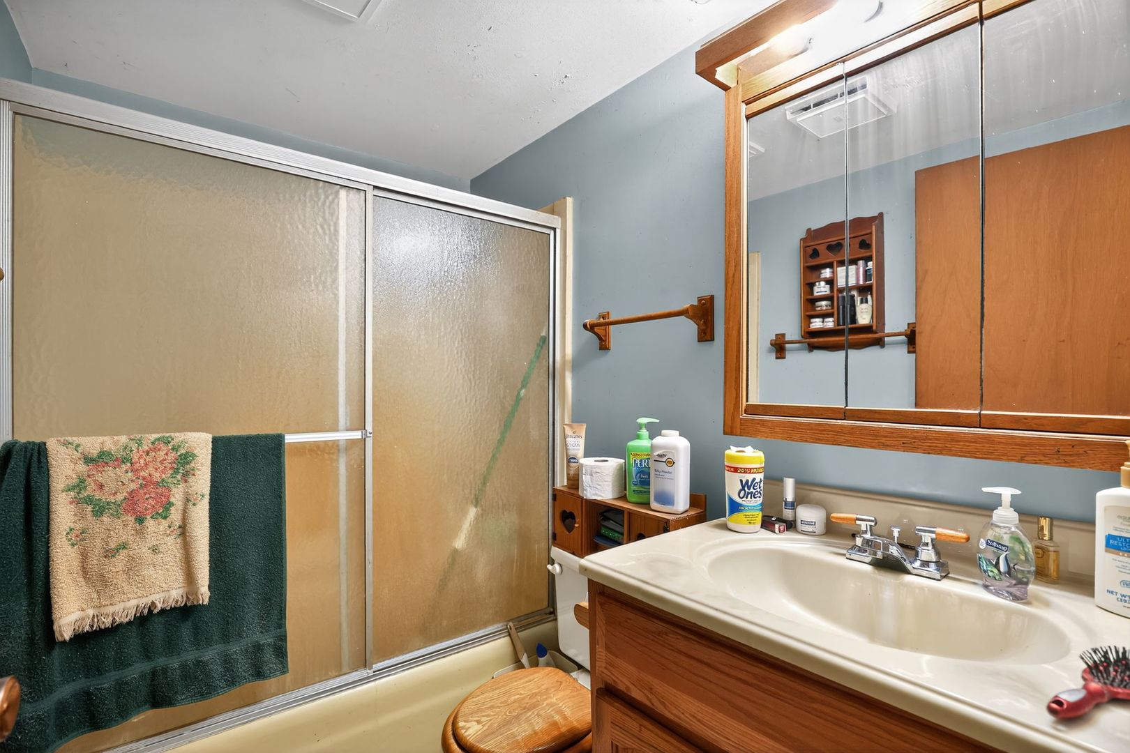 21364 Burr Oak Road Harvard, IL 60033 - Photo 13 of 15 a bathroom with a sink and a mirror