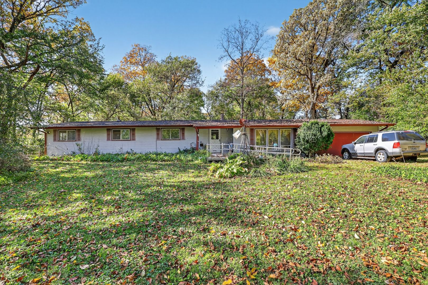 21364 Burr Oak Road Harvard, IL 60033 - Photo 2 of 15 a front view of a house with garden