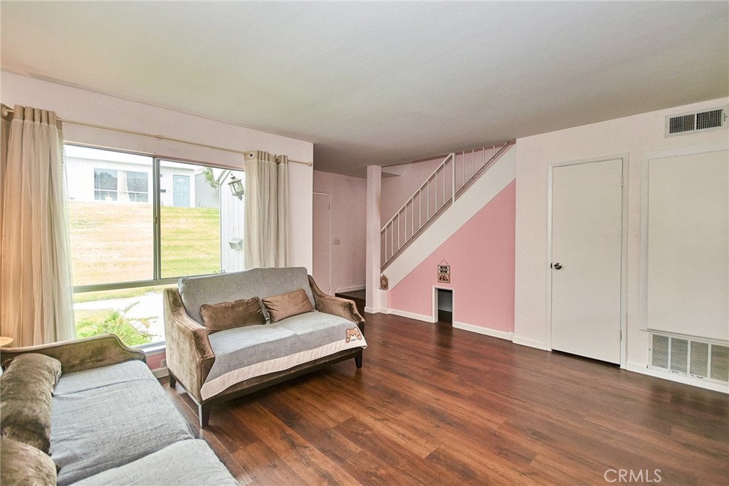 23507 Twin Spring Lane Diamond Bar, CA 91765 - Photo 12 of 27 a spacious bedroom with a bed and wooden floor