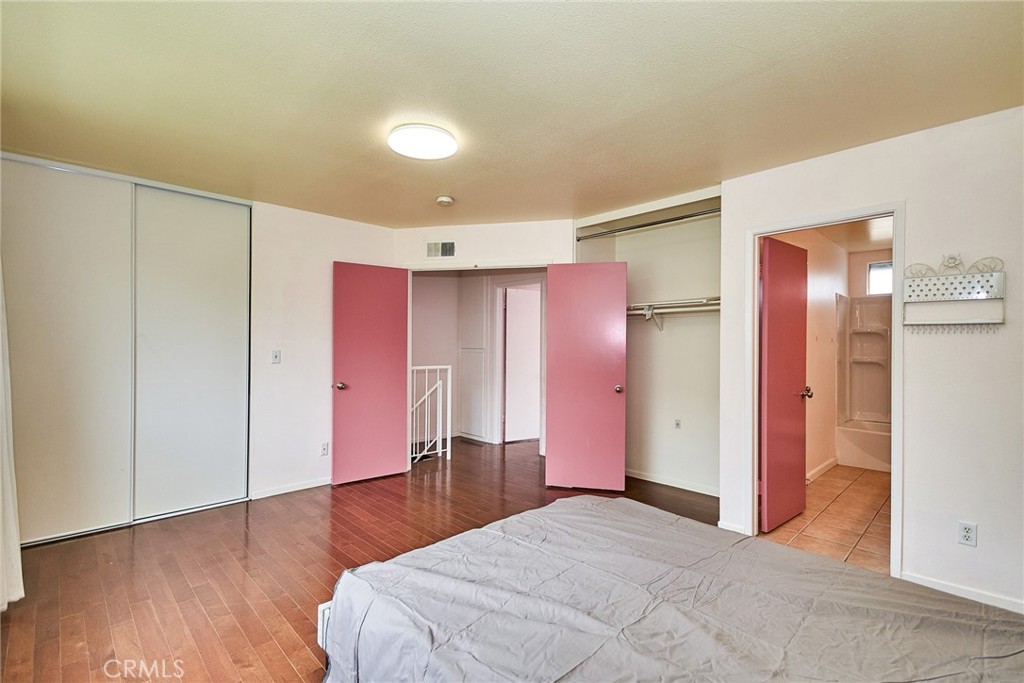 23507 Twin Spring Lane Diamond Bar, CA 91765 - Photo 16 of 27 a spacious bedroom with a bed and a dresser