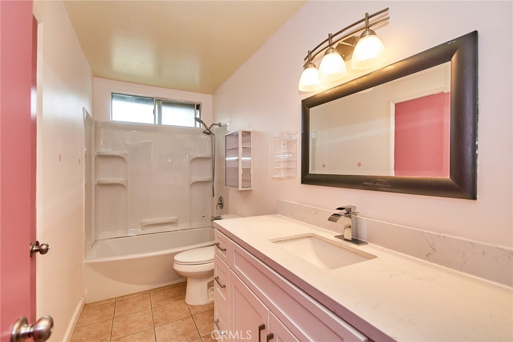 23507 Twin Spring Lane Diamond Bar, CA 91765 - Photo 17 of 27 a bathroom with a sink a toilet and shower