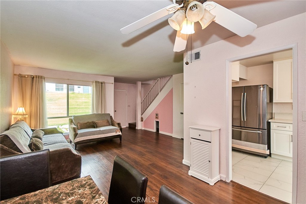 23507 Twin Spring Lane Diamond Bar, CA 91765 - Photo 7 of 27 a living room with furniture and a chandelier