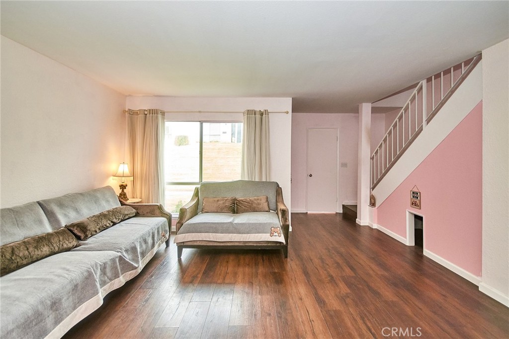 23507 Twin Spring Lane Diamond Bar, CA 91765 - Photo 9 of 27 a spacious bedroom with a bed couch and a window