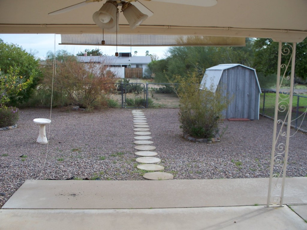 6021 East Decatur Street Mesa, AZ 85205 - Photo 2 of 2 Backyard with the storage
