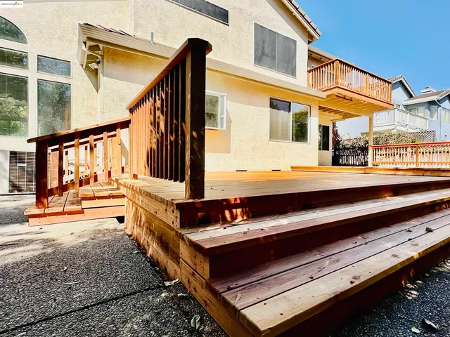 a view of a wooden roof deck