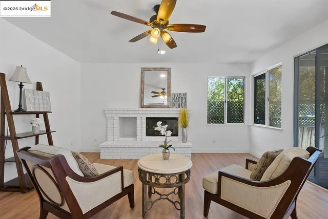 a living room with furniture and a window