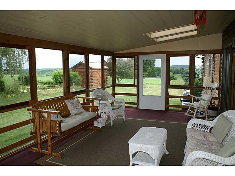 123 Reay Lane Butler, PA 16002 - Photo 14 of 25 Patio/Deck. screened porch has windows of laminated safety glass