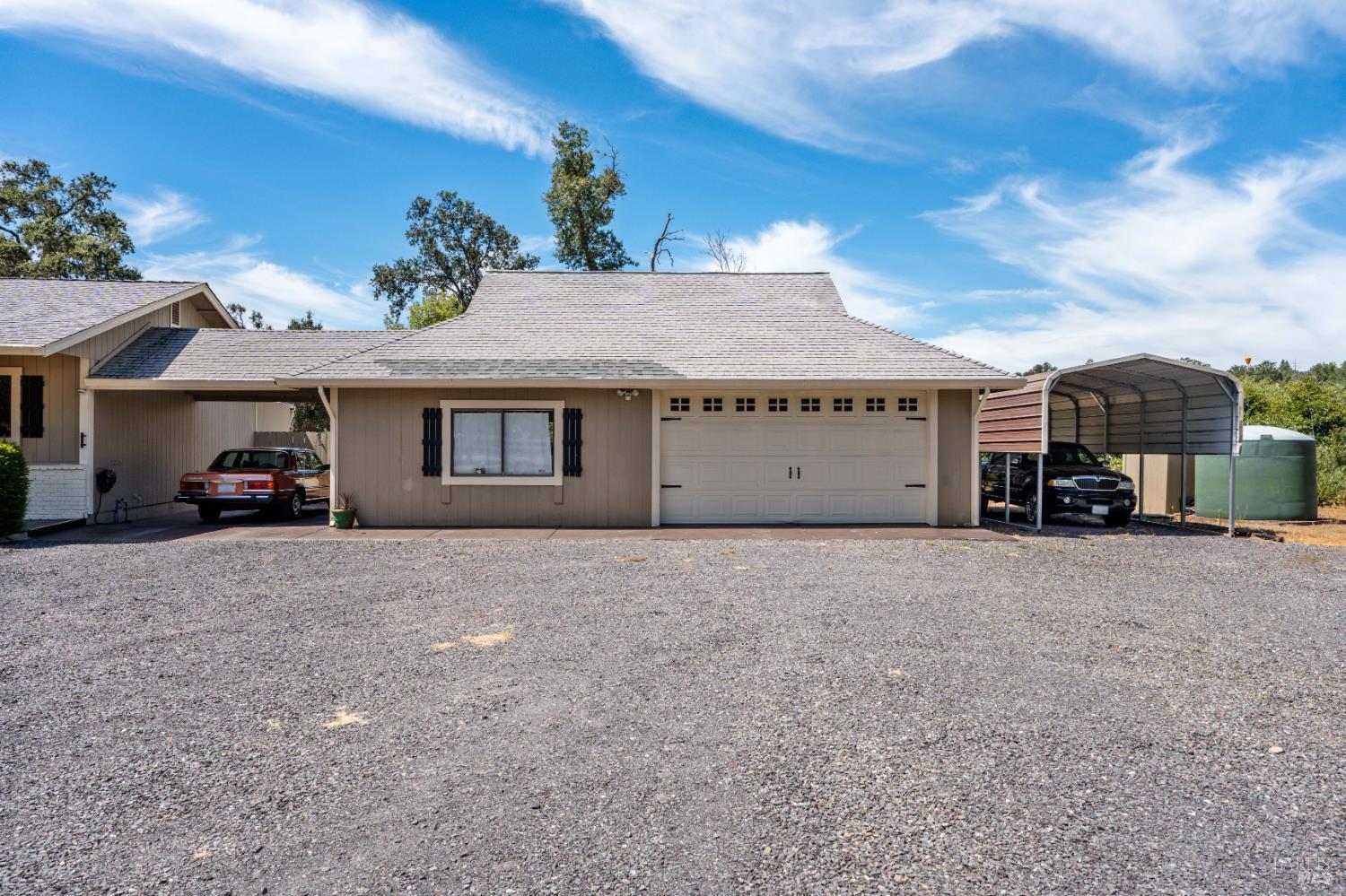 8960 East Road Redwood Valley, CA 95470 - Photo 30 of 37 Carport and Hobby Room/Shop with Secondary Garage and RV/Boat Cover