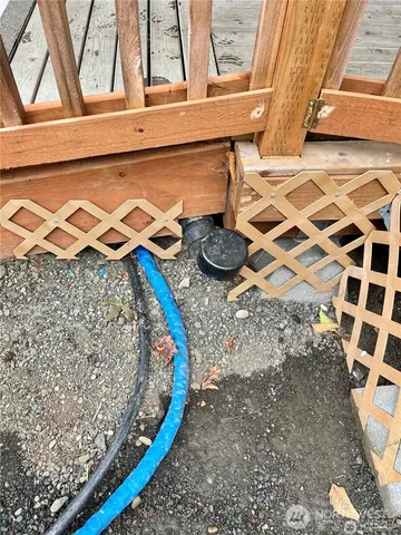 a view of a swimming pool with a sink and a yard