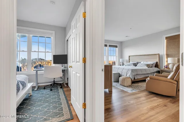 a room with furniture and a wooden floor