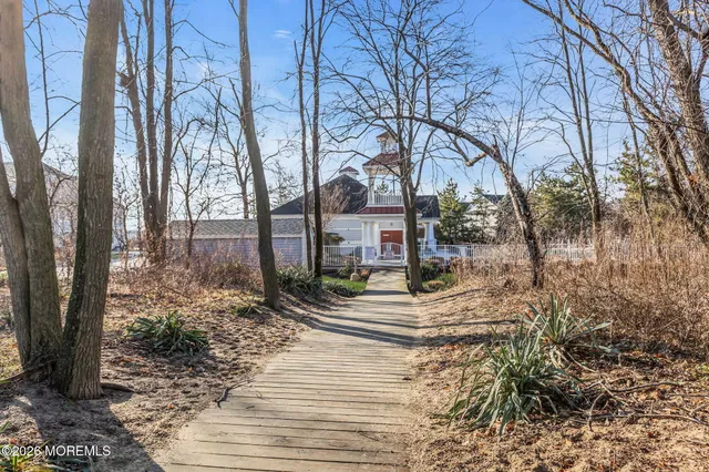 a view of a trees in front of a house