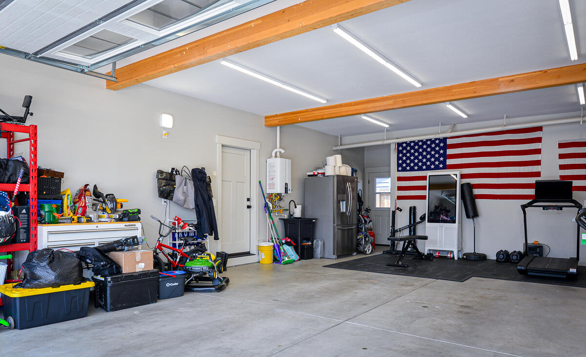 1029 Brandon Way Phoenix, OR 97535 - Photo 59 of 75 Extra storage in back of garage with a door at the back to the patio
