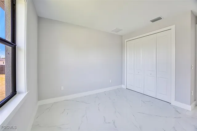 a view of a bathtub & cabinet in a room