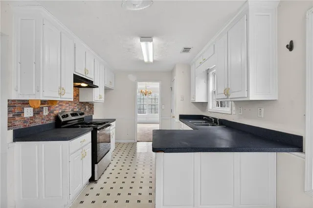 a view of balcony with wooden floor and fence