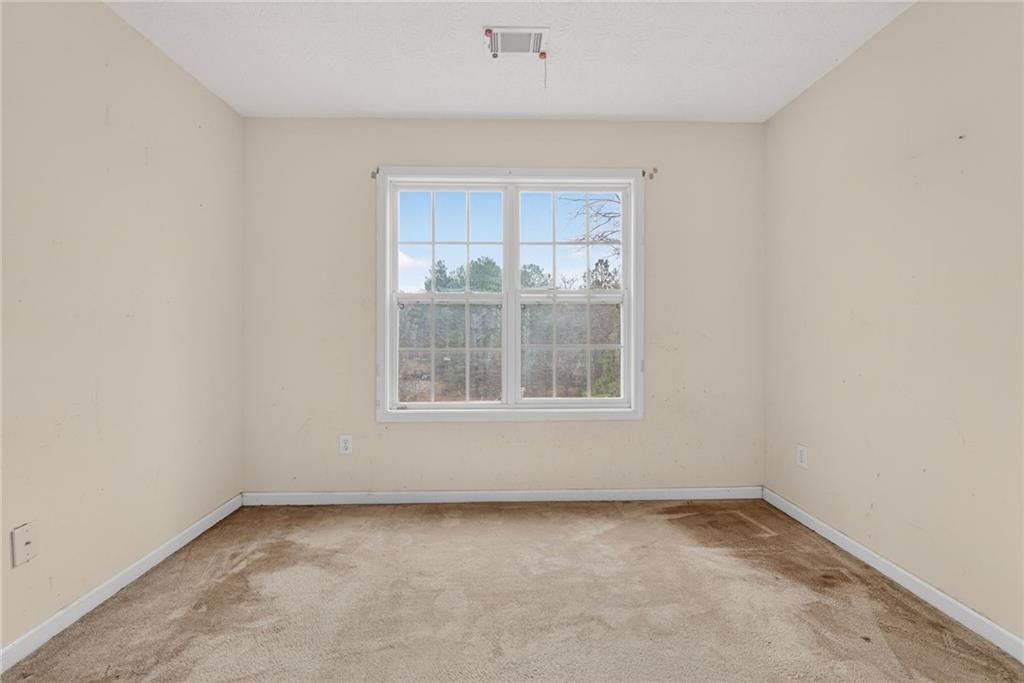 20 Crooked Creek Way Covington, GA 30016 - Photo 39 of 59 an empty room with a window