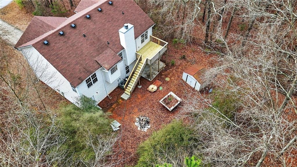 20 Crooked Creek Way Covington, GA 30016 - Photo 59 of 59 an aerial view of a house with a yard and wooden fence