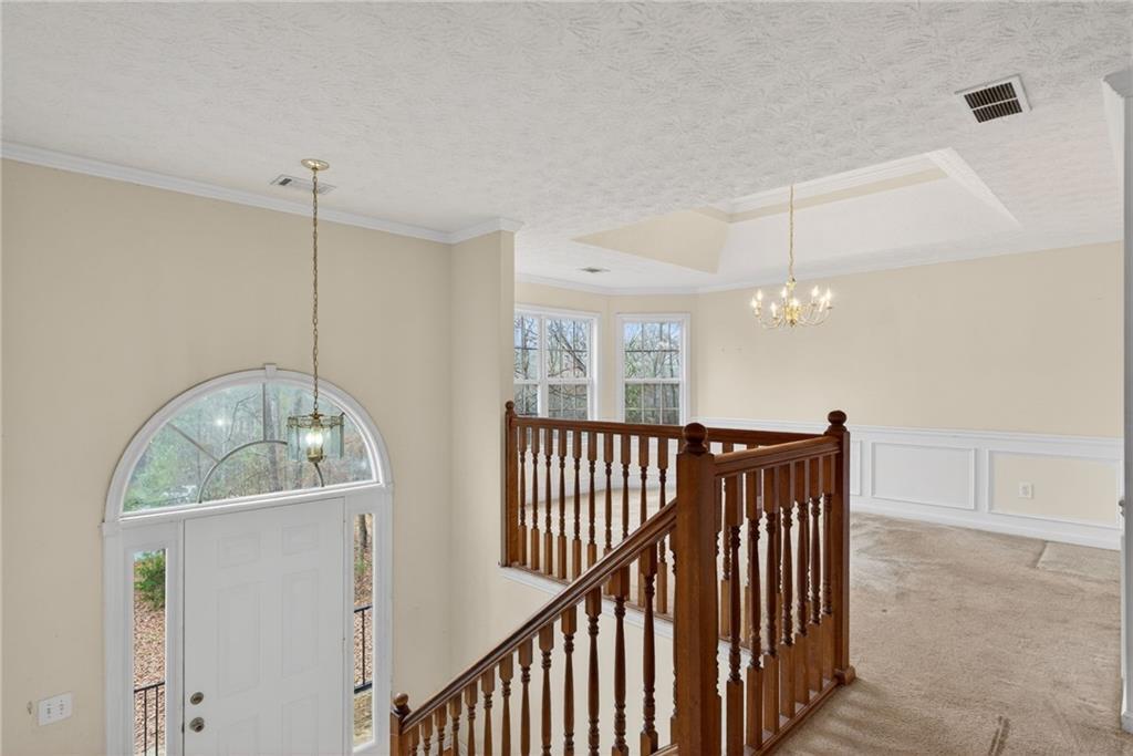 20 Crooked Creek Way Covington, GA 30016 - Photo 10 of 59 a view of entryway and hall with wooden floor