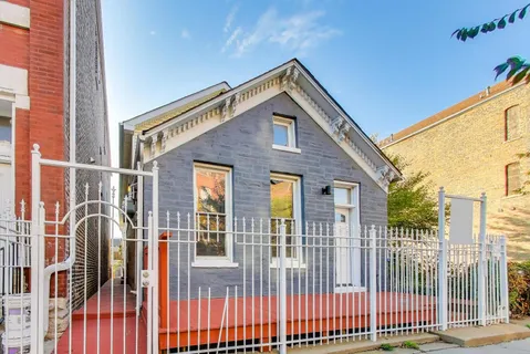 a front view of a house with a porch