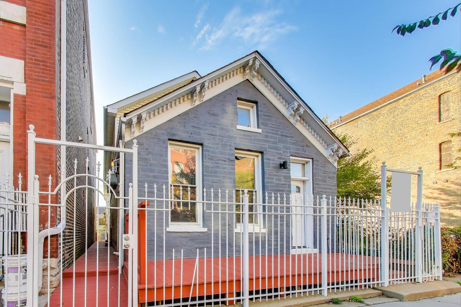 a front view of a house with a porch