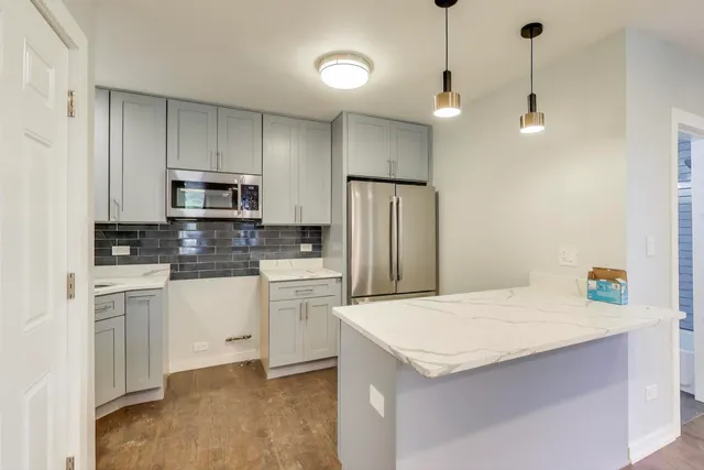 a bathroom with a toilet and a sink