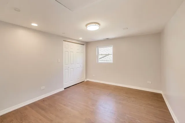 a view of a big room with white walls