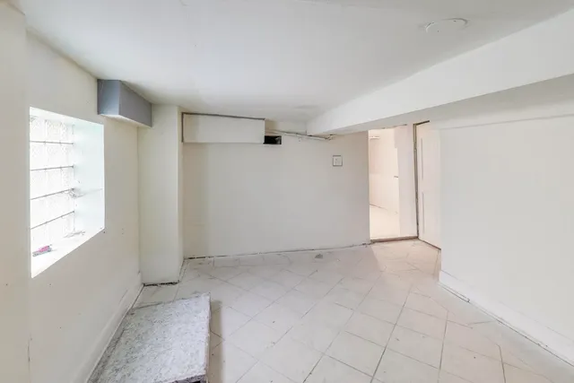 a balcony with view of outdoor space