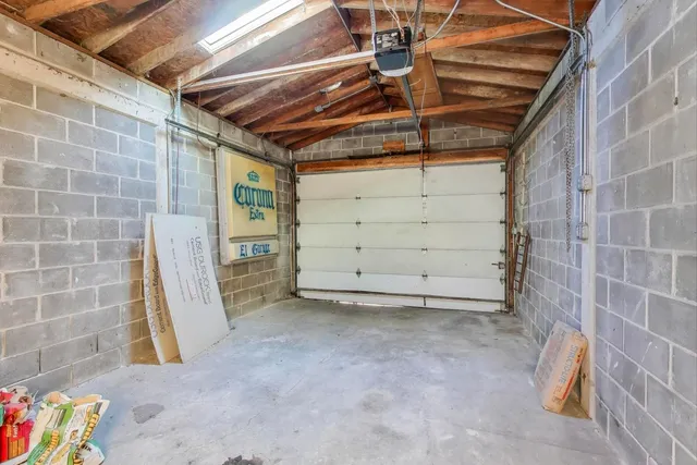 a backyard of a house with outdoor seating