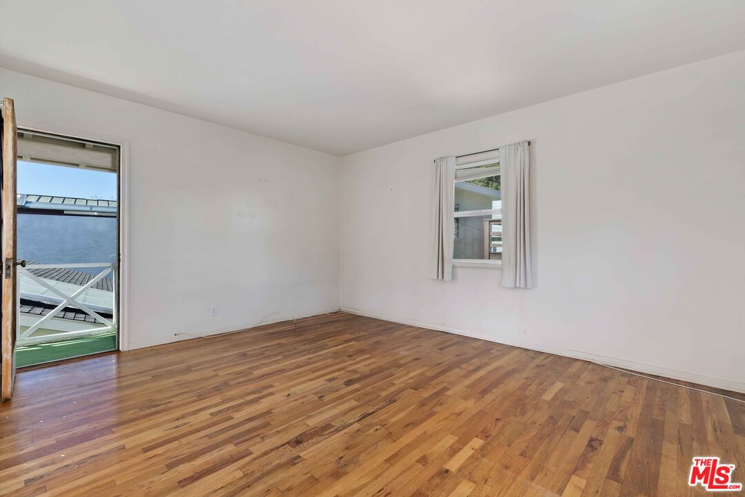 363 West Channel Road Santa Monica, CA 90402 - Photo 13 of 21 a view of empty room with wooden floor