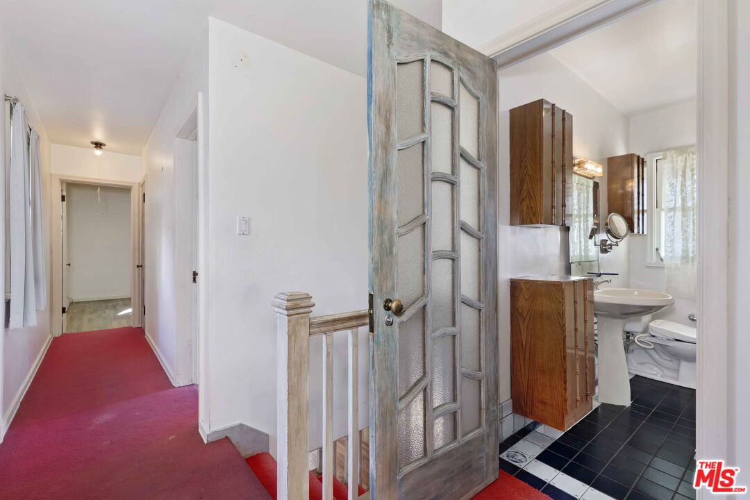 363 West Channel Road Santa Monica, CA 90402 - Photo 14 of 21 a view of hallway with walk in closet