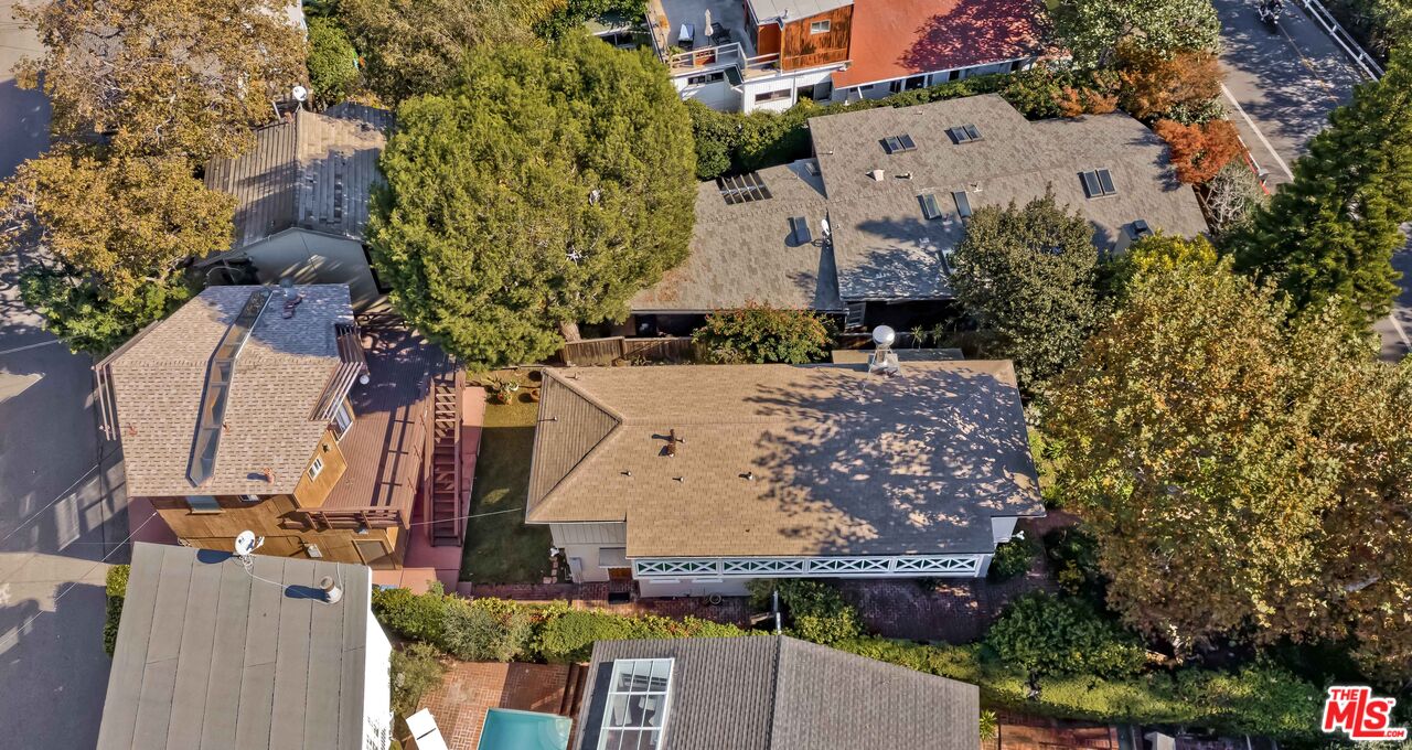 363 West Channel Road Santa Monica, CA 90402 - Photo 20 of 21 an aerial view of a house with a yard and large trees