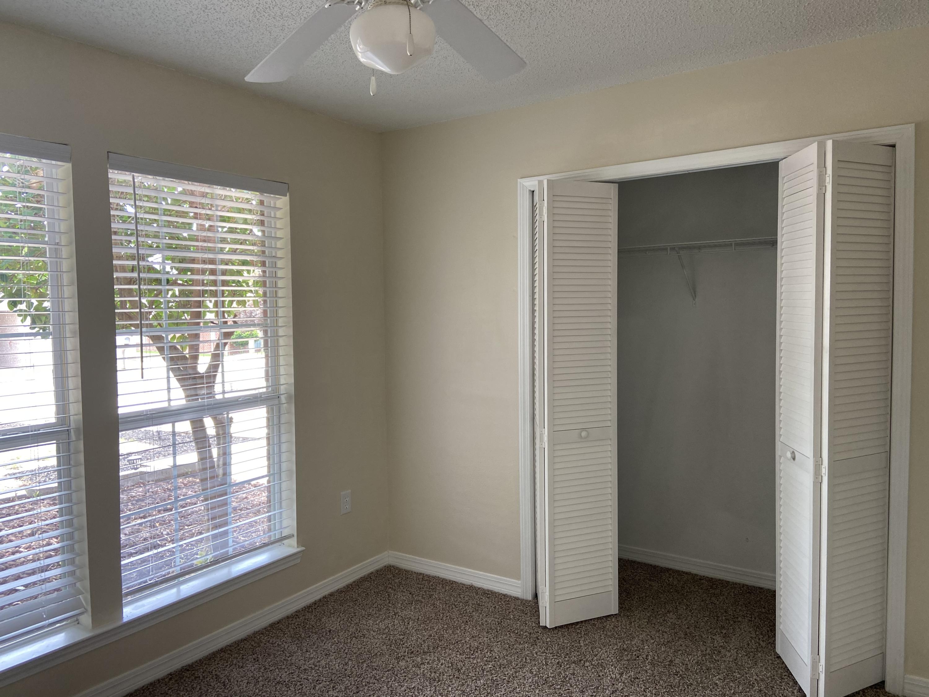 239 Limestone Circle Crestview, FL 32539 - Photo 9 of 15 a view of an empty room with a window