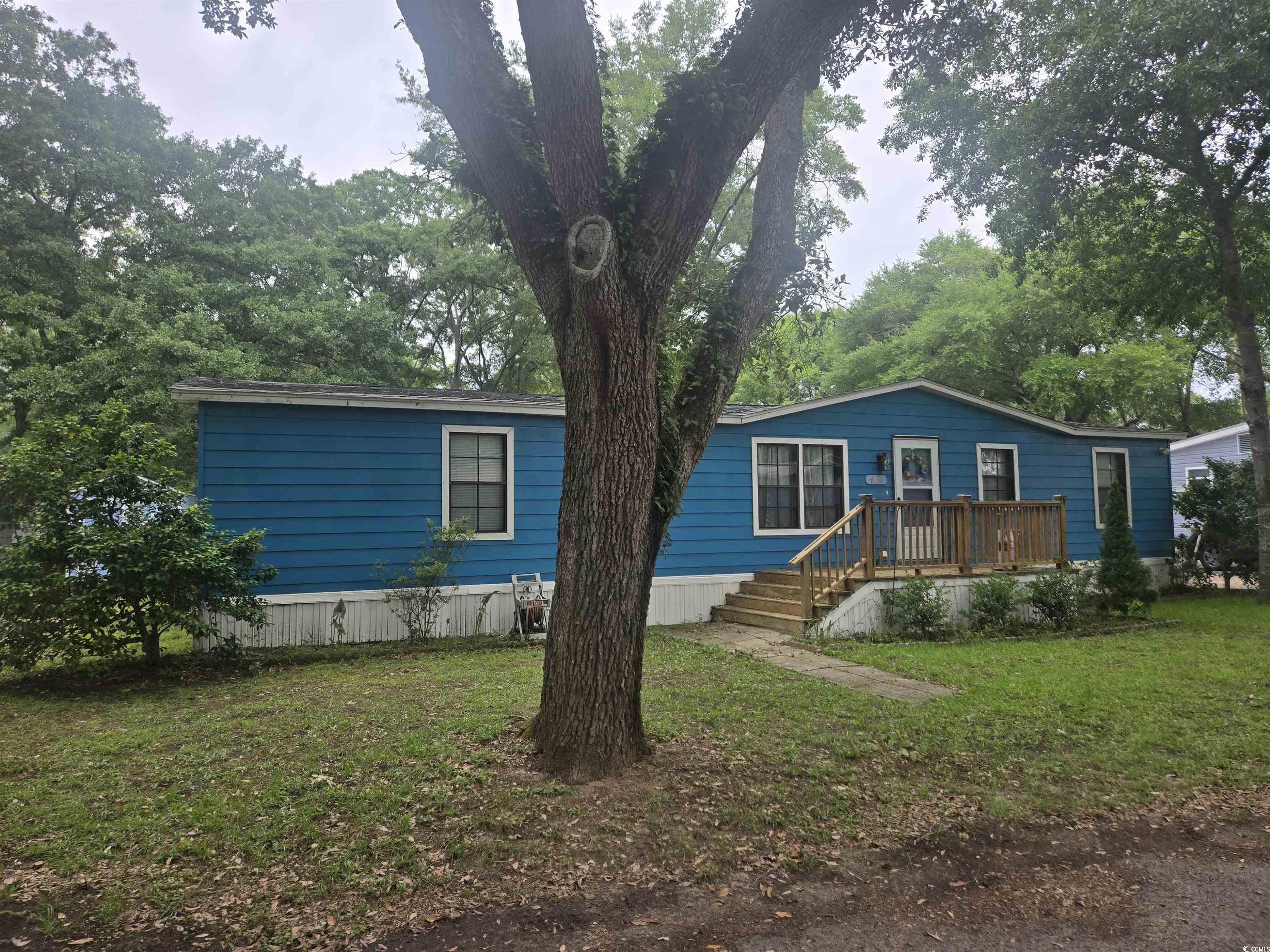 494 Clubhouse Road Murrells Inlet, SC 29576 - Photo 2 of 26 Manufactured / mobile home with a front yard