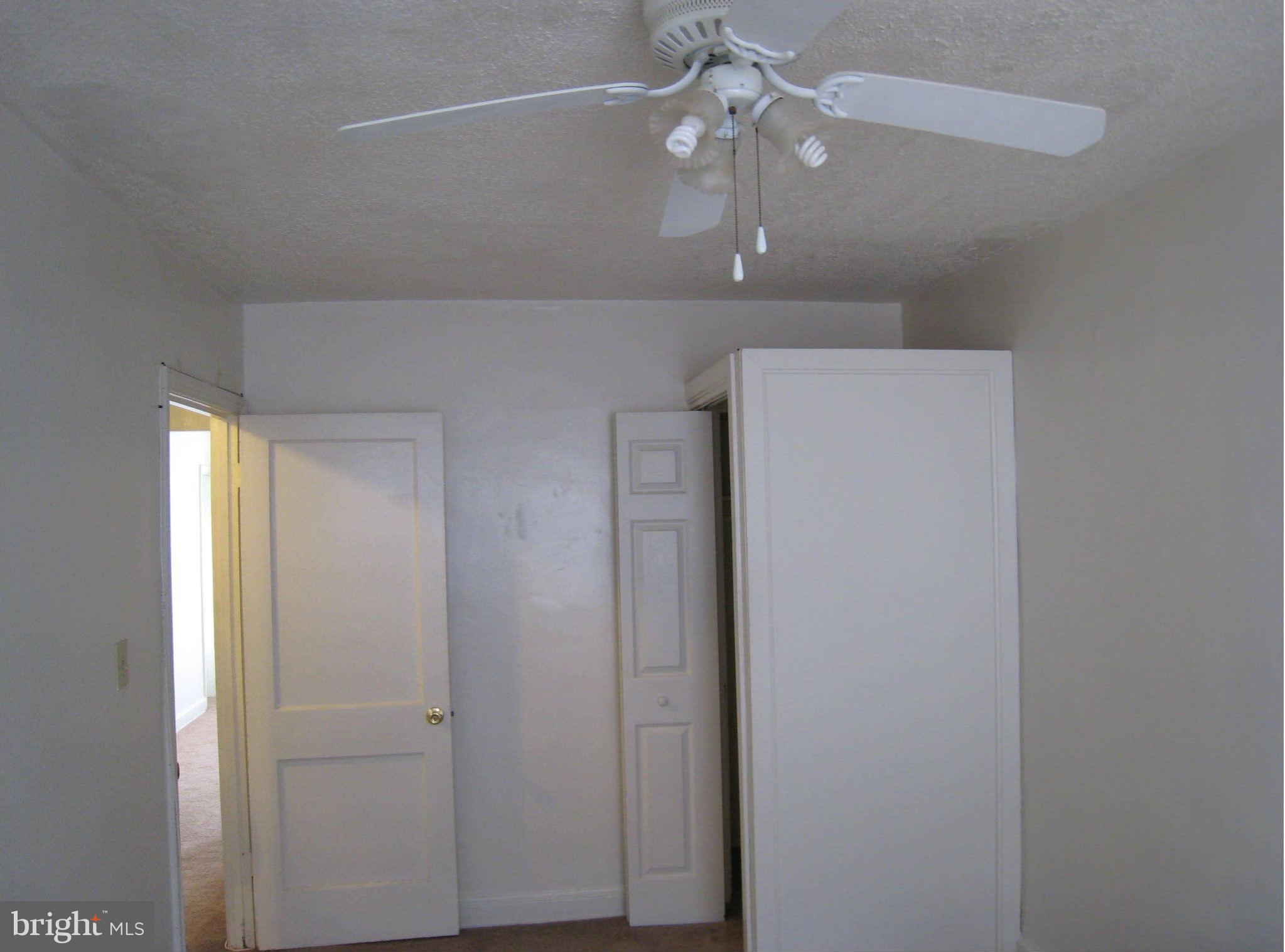 1938 I Street Northeast Washington, DC 20002 - Photo 11 of 18 an empty room with chandelier fan