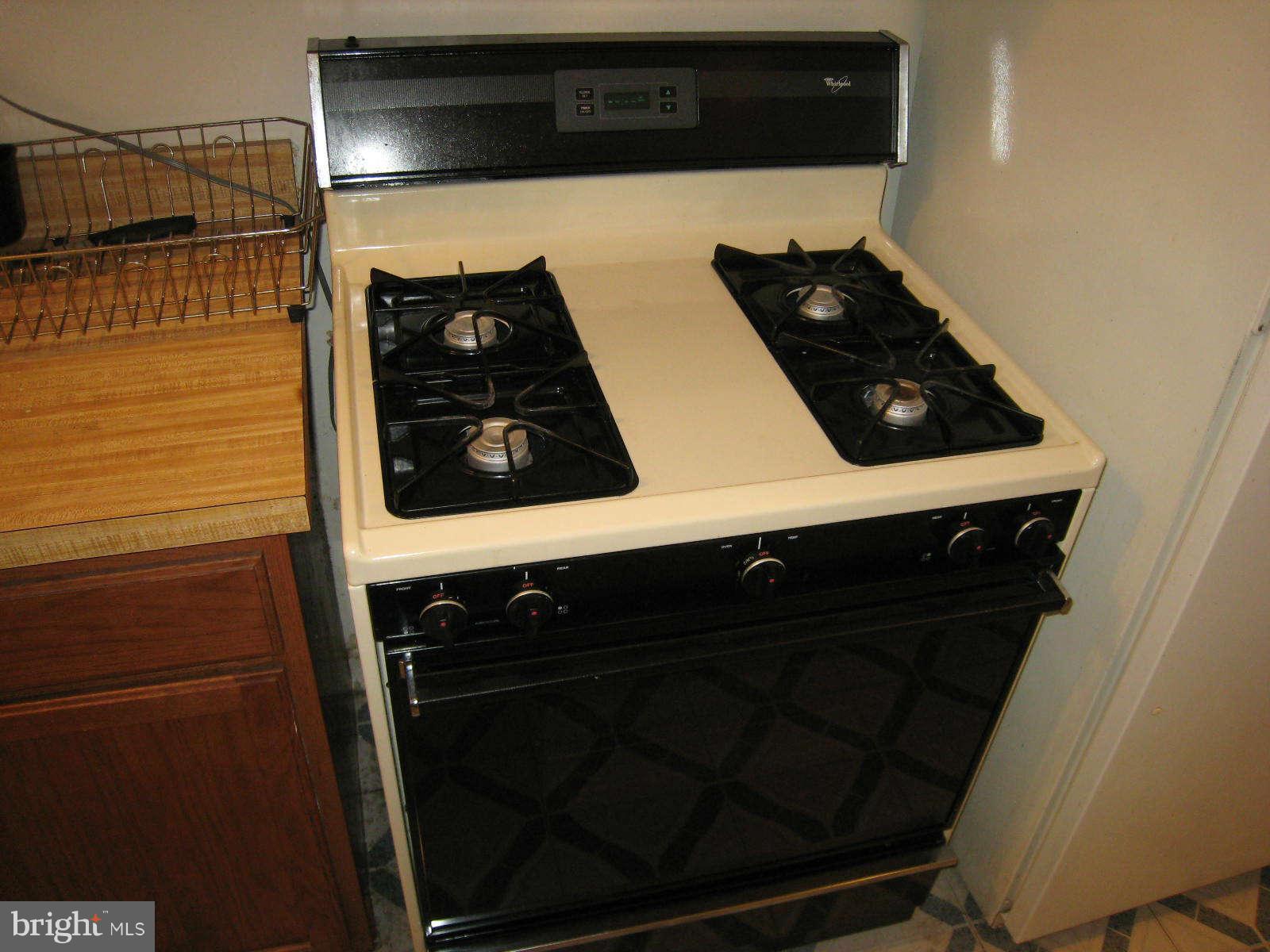 1938 I Street Northeast Washington, DC 20002 - Photo 15 of 18 a close view of sink and washing machine
