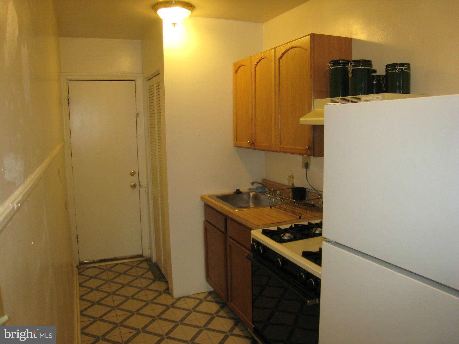1938 I Street Northeast Washington, DC 20002 - Photo 17 of 18 a bathroom with a sink and a mirror