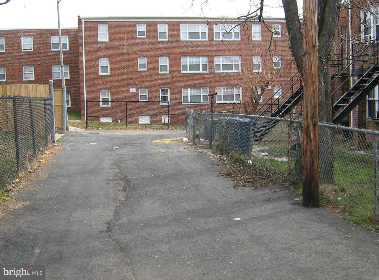 1938 I Street Northeast Washington, DC 20002 - Photo 4 of 18 a view of a brick building next to a road