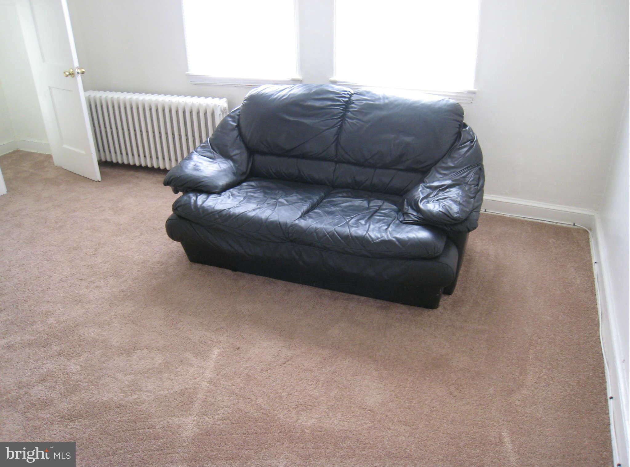 1938 I Street Northeast Washington, DC 20002 - Photo 7 of 18 a living room with furniture