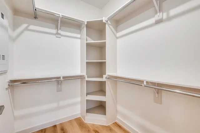 a view of an empty walk in closet